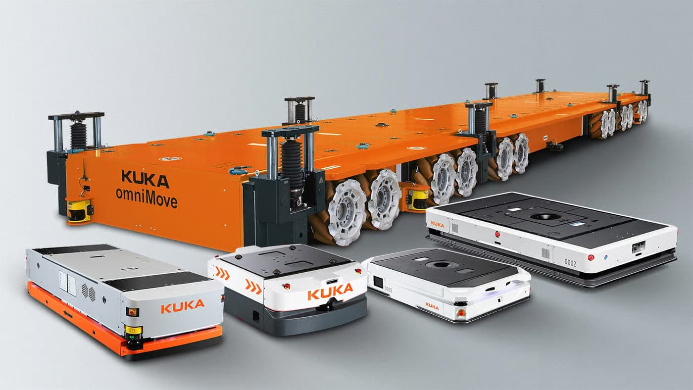 Autonomous mobile robots carrying load-handling top modules across a plant floor